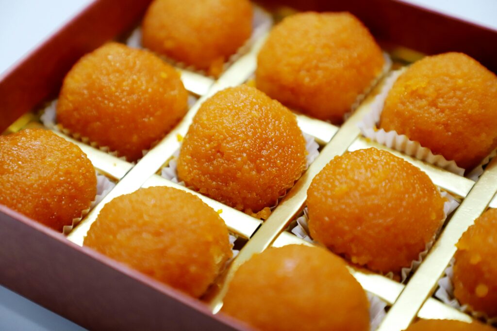 pexels photo 19151502 19151502 Delicious Indian laddoos in a box, perfect for celebrations and festive occasions.